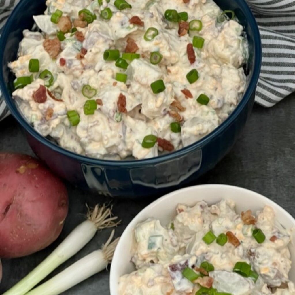 Loaded Baked Potato Salad is a yummy salad recipe with the great tastes of ranch and bacon with tender potatoes and cheddar cheese. #PotatoSalad #LoadedBakedPotato #Salads #BarbecueRecipes #SideDish