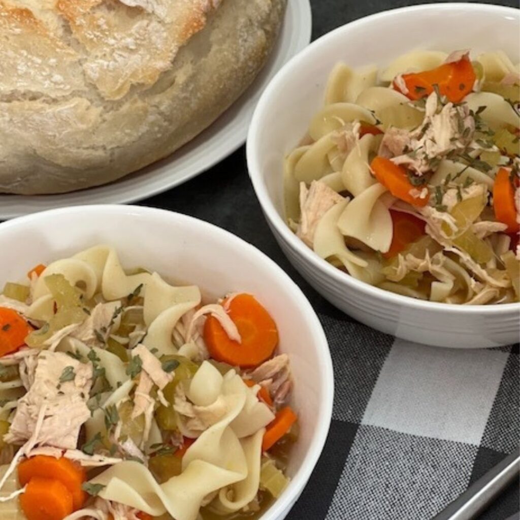 Slow Cooker Chicken Noodle Soup is a simple and delicious comfort food recipe that you will want to make again and again. #Chicken #Soup #SlowCooker #EasyRecipes #ComfortFood  #ChickenNoodleSoup
#HomemadeSoup