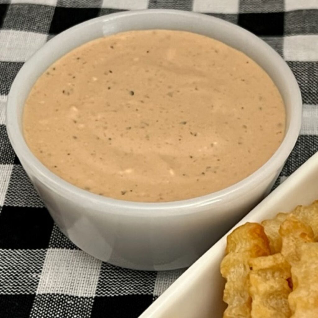 Copycat Raising Cane's Dipping Sauce is a super simple and yummy dipping sauce recipe that is great with chicken, fries, burgers and brats. #RaisingCanesDippingSauce #FrySauce #Condiments #CopycatRecipes
