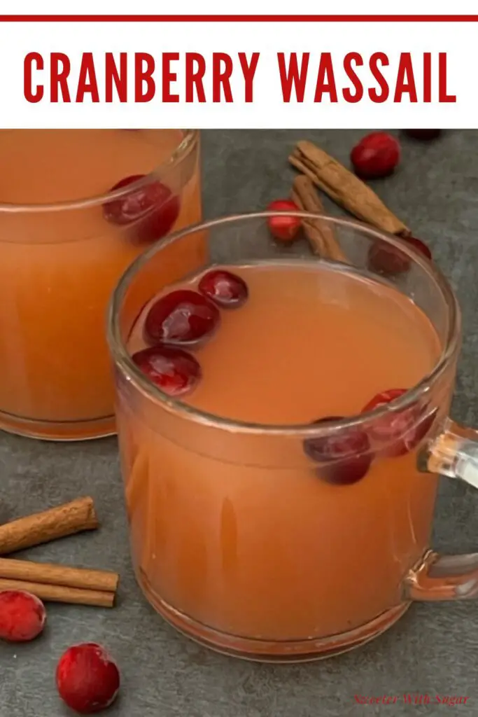 Cranberry Wassail is the perfect hot beverage recipe for the holidays. It is simple to make and delicious-perfect for a cold winter night. #Christmas #Thanksgiving #Wassail #HotBeverages #Drinks #Cranberry #Cinnamon