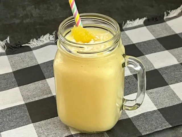 Pina Colada Smoothie is a refreshing and delicious beverage recipe that is simple to make. #Smoothies #BreakfastSmoothies #FrozenDrinks #Beverages #Drinks #TropicalDrinks