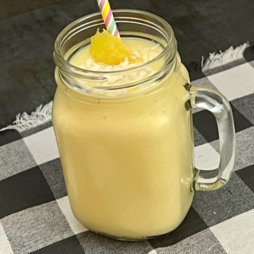 Pina Colada Smoothie is a refreshing and delicious beverage recipe that is simple to make. #Smoothies #BreakfastSmoothies #FrozenDrinks #Beverages #Drinks #TropicalDrinks 
