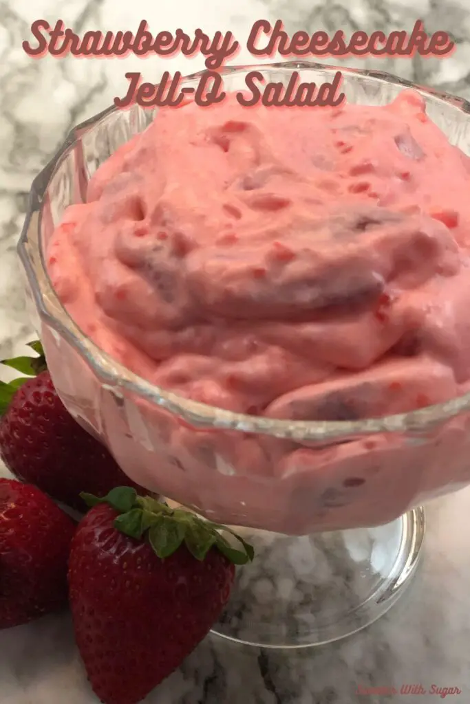 Strawberry Cheesecake Jell-O Salad is a simple, delicious Jell-O fruit salad recipe. This recipe uses fresh strawberries. #JellO #JelloSalads #Strawberries #FruitSalads #SummerSalads #Cheesecake