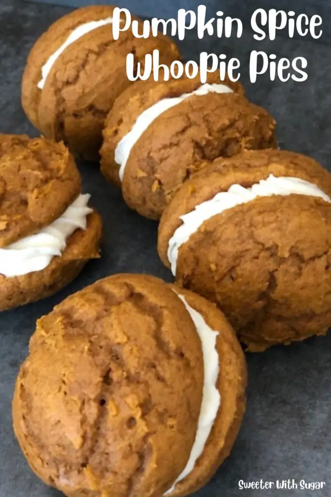 Pumpkin Spice Whoopie Pies are delicious and fun to make for the fall season. They are the perfect dessert! #Pumpkin #PumpkinRecipes #Cookies #WhoopiePies #arshmallowFrosting