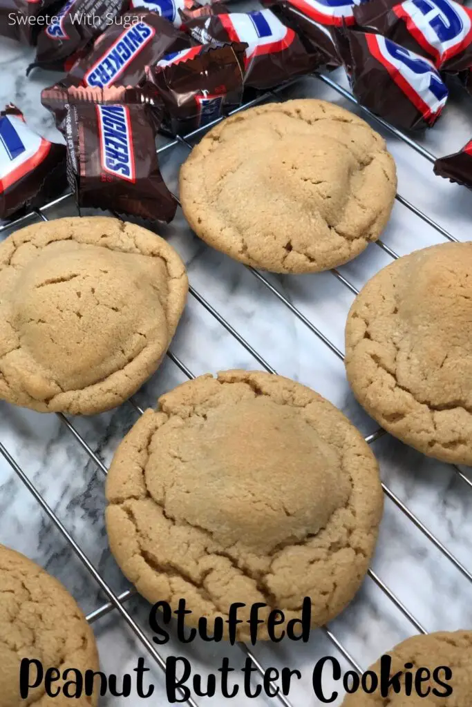 Stuffed Peanut Butter Cookies are delicious. We have stuffed these with mini Snickers. We also like to stuff peanut butter cookies with other candy bars, too. #Cookies #PeanutButterCookies #Snickers #StuffedCookies