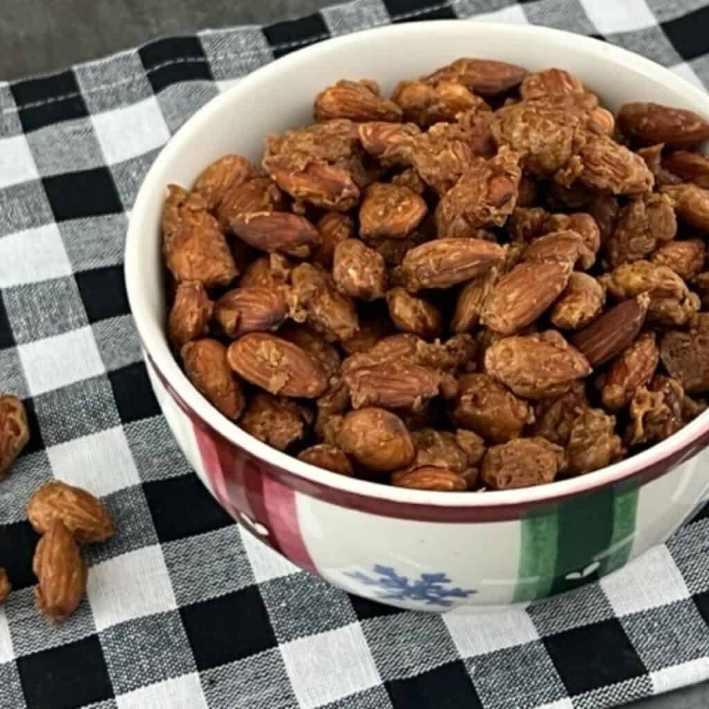 Cinnamon Almonds are the perfect snack! They are crunchy and sweet with a hint of cinnamon. #RoastedAlmonds #CopyCatRecipes #TotallyNutsCinnamonAlmonds #Cinnamon Almonds #CandiedAlmonds #CandiedNuts