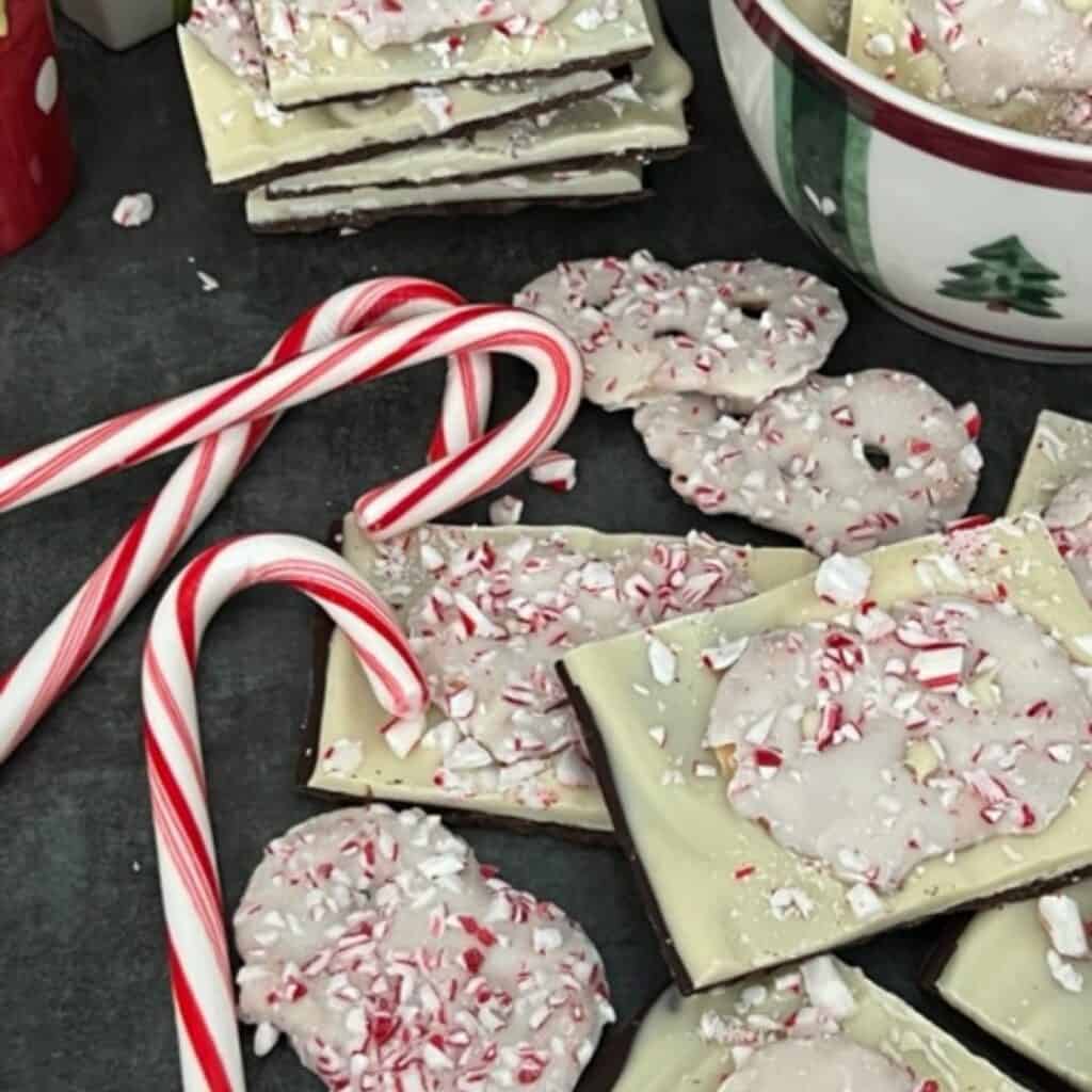 Peppermint Bark is a Christmas treat that is pretty and delicious! It is quick and easy to make. The dark and white chocolate with the peppermint is a perfect combination. #PeppermintBark #ChristmasCandy #DarkChocolate #WhiteChocolate #Peppermint #HolidayTreats