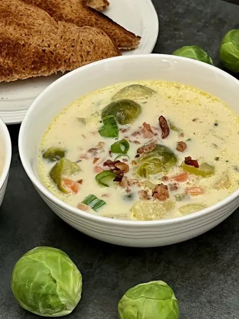 Brussels Sprouts Soup is a delicious comfort food recipe that is filled with vegetables. If you love Brussels Sprouts you will love this soup. #BrusselsSprouts #Soup #ComfortFood #EasyRecipes #Vegetables