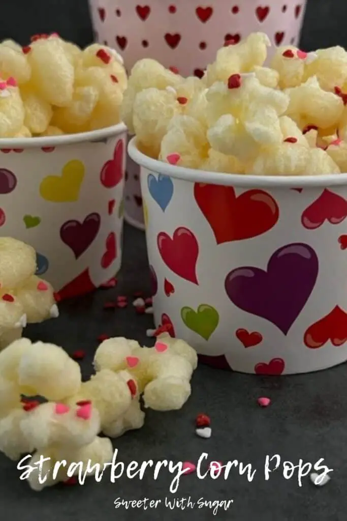 Strawberry Corn Pops is a fun and yummy treat for Valentine's Day! This is a simple and quick recipe you will love. #CornPops #CornPuffs #PriatesBooty #CloverClubCornPops #CaramelCorn #Strawberry #ValentinesDayIdeas #ValentinesDayRecipes