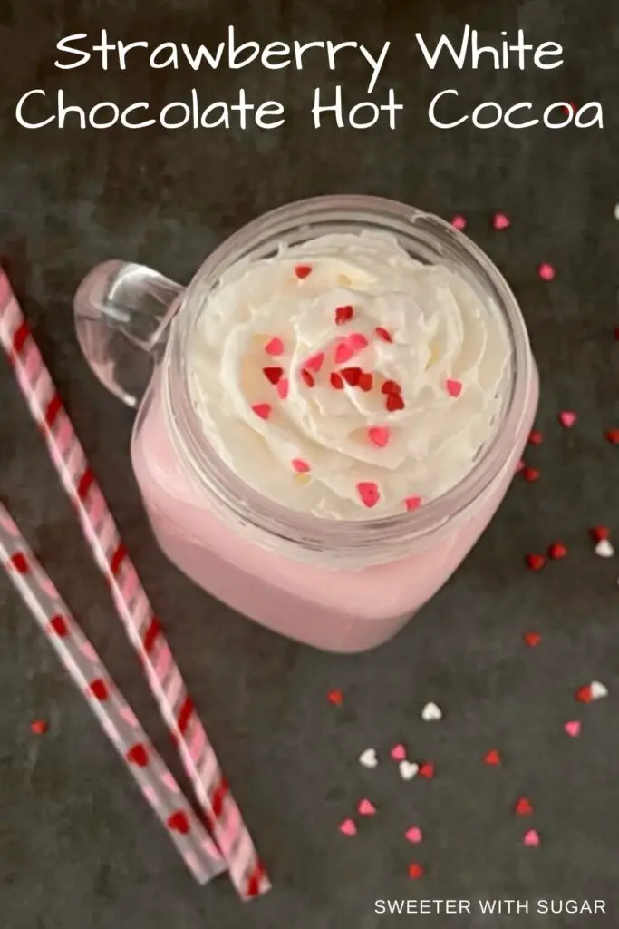 Strawberry White Chocolate Hot Cocoa is a fun and pretty Valentine's Day beverage. The kids will love the flavor, sprinkles and whipping cream. #Beverages #ValentinesDay #ValentinesRecipes #HotBeverageIdeas #Strawberry #WhiteChocolate #StephensHotCocoa #NesquikStrawberrySyrup