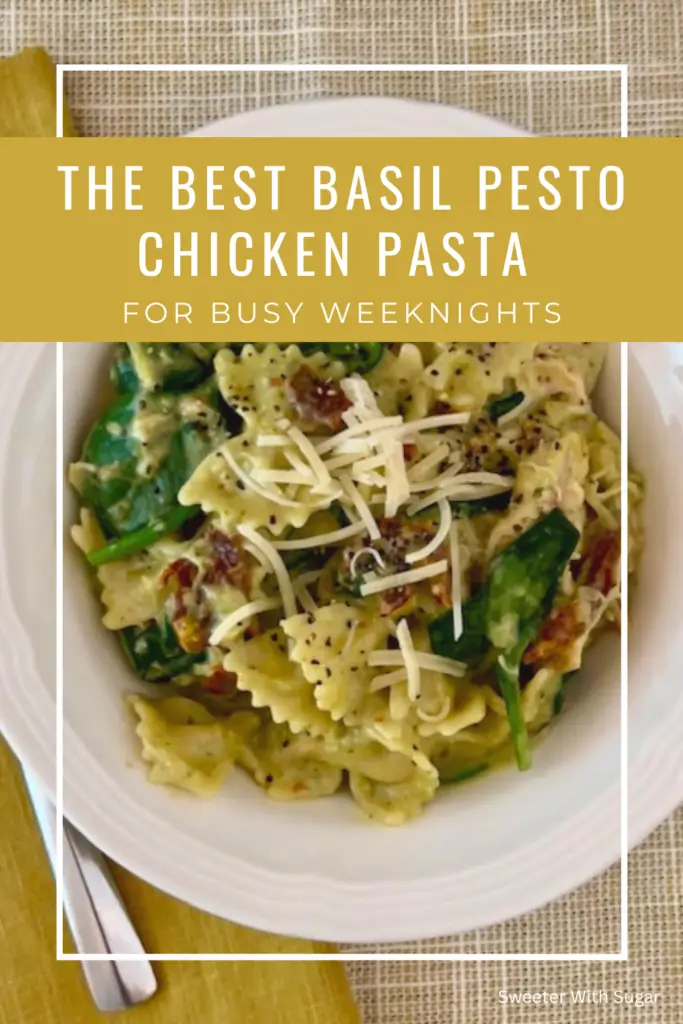 Creamy Basil Pesto Chicken Pasta served in a bowl and topped with parmesan cheese.