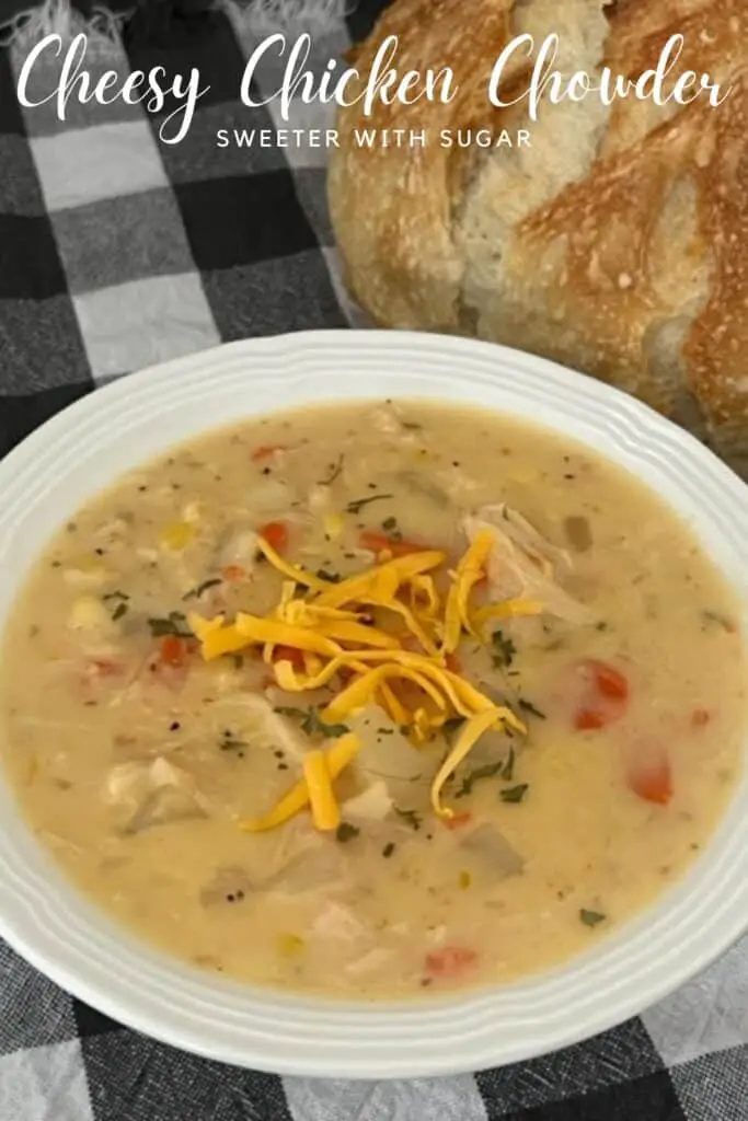 Cheesy Chicken Chowder is an easy slow cooker meal. It is thick and creamy. It is filled with chicken and vegetables. #Chowder #SlowCooker #SoupRecipes #CheesySoup #CrockPotSoup #CreamyVegetableSoup