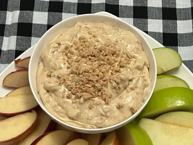 Apple Brickle Dip is a quick and delicious dip for fall or anytime! It is rich and creamy. It tastes great on sliced apples. #FallRecipes #AppleBrickleDip #ToffeeDip #CreamCheeseDip #AppleDip