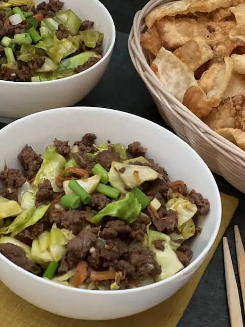 Egg Roll in a  Bowl is a one pan dinner recipe with cabbage, carrots, green onion ground pork and seasonings. This recipe is simple and delicious.#EggRolls #OnePanMeals #AsianRecipes #EasyDinners