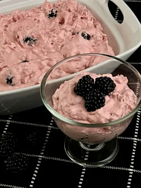 Blackberry Jell-O Salad is a creamy and sweet Jell-O salad recipe. It is easy to make and perfect for summer barbecues and for holiday dinners. #JellOSalads #Blackberries #EasySalads #CoolWhip #CoolWhipSalads #BlackberrySalad