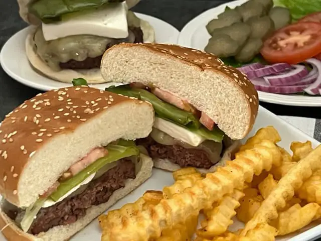 Salt City Copycat Mexicali Jack Burger is a delicious copycat recipe with pepper jack. cheese, cream cheese and roasted Anaheim peppers. #CopycatRecipes #Burgers #SaltCItyBurgers #GrillingRecipes