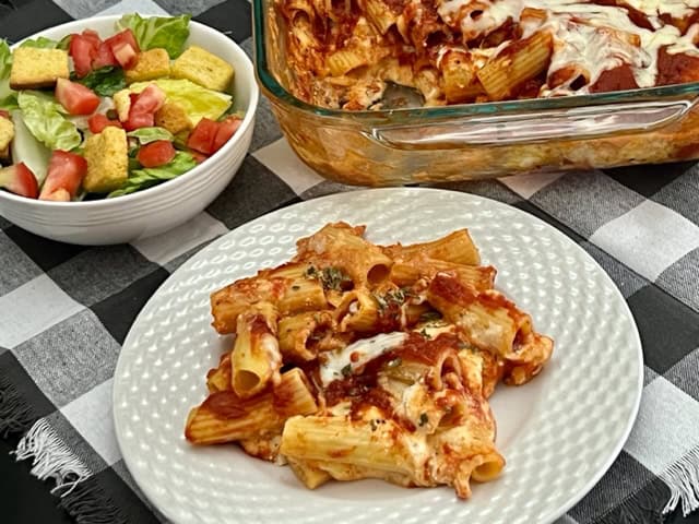 Manicotti Casserole is a simple comfort food recipe that is quick to put together and delicious to eat! #Manicotti #ComfortFood #Pasta #CheesyDinnerRecipes #ItalianRecipes