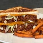 Pulled Pork Grilled Cheese is a simple recipe made with barbecue pulled pork, grilled bread covered in melty cheese. You can even use leftover barbecue pulled pork. #BarbecuePulledPork #GrilledCheese #Sandwiches #EasyDinnerRecipes #PorkRecipes