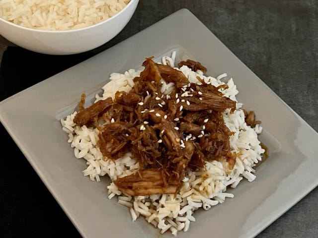 Korean Pork is a simple dinner recipe with a yummy Asian flavor. The sauce is so delicious. #DinnerIdeas #DinnerRecipes #PorkRecipes #AsianRecipes #PorkLoin #SlowCookerRecipes