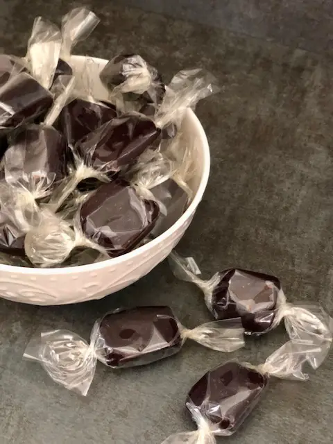 Black Licorice Caramel is fun to make for Halloween. Wrap the caramels up in candy wrappers place them in Halloween treat bags for fun gifts. 