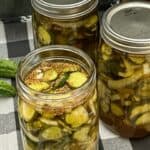 Refrigerator Bread and Butter Pickles are easy and yummy! They are a great way to use garden cucumbers, too. #Pickles #BreadAndButterPickles #HomemadePickles #GardenCucumbers #RefrigeratorPickles