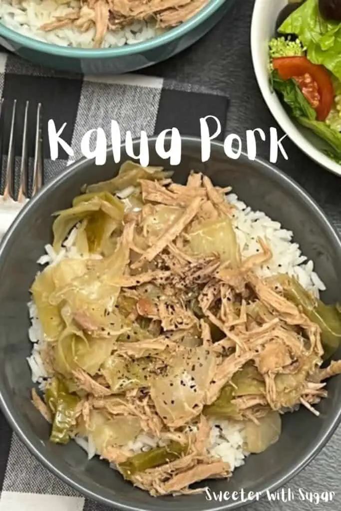 Kalua Pork is a simple slow cooker dinner recipe  that will remind you of a Hawaiian Luau. #Pork Recipes #EasyDinner #SlowCooker #WeeknightDinners #KaluaPork