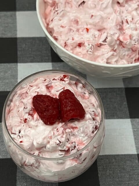 Raspberry Fool is a classic, lite and refreshing salad or dessert recipe. The homemade whipping cream and the fresh raspberries make this recipe delicious! #Raspberry #ClassicRecipes #WhippingCream #Raspberries #DessertRecipes #FruitSaladRecipe