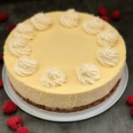 Vanilla Cheesecake is a classic dessert recipe. It is smooth and creamy and so versatile. Add raspberries, blueberries, blackberries, or other berries you like. It is also delicious with a raspberry sauce drizzled over the top. Also, it is great plain with a bit of whipping cream. #CheesecakeRecipes #DessertRecipes #VanillaCheesecake #HomemadeCheesecake