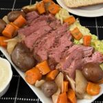 Corned Beef and Cabbage with Horseradish Sauce is the perfect meal to celebrate St. Patrick's Day. This is made in the slow cooker and turns out very tender. #StPatricksDay #CornedBeefAndCabbage #HorseradishSauce #SlowCookerRecipes #HolidayRecipes
