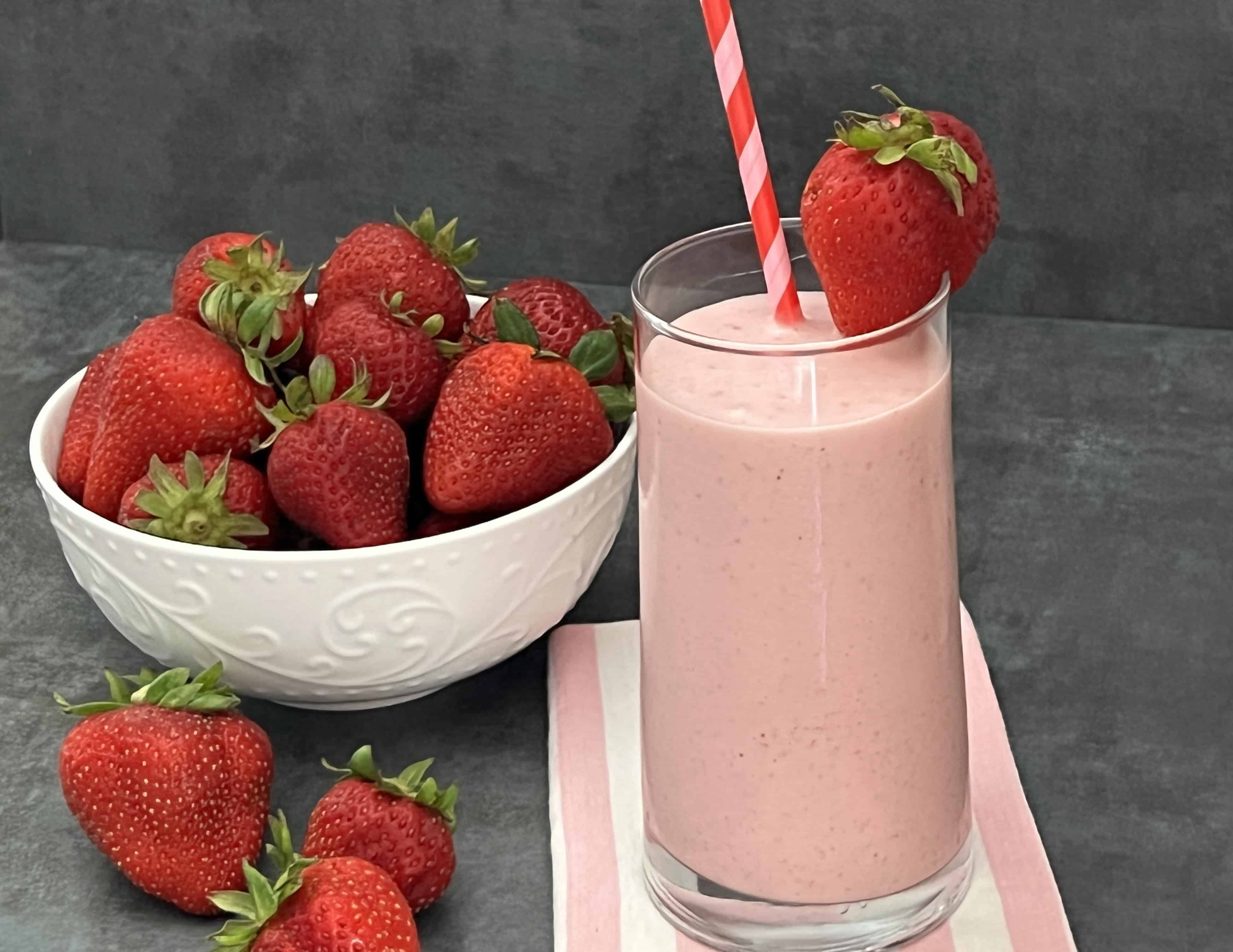 Strawberry Smoothie is a delicious and refreshing drink recipe made with healthy ingredients you will feel good about drinking. Smoothies are great for breakfast! #Smoothies #BreakfastDrinks #FrozenBeverages #DrinkRecipes #Protein Powder