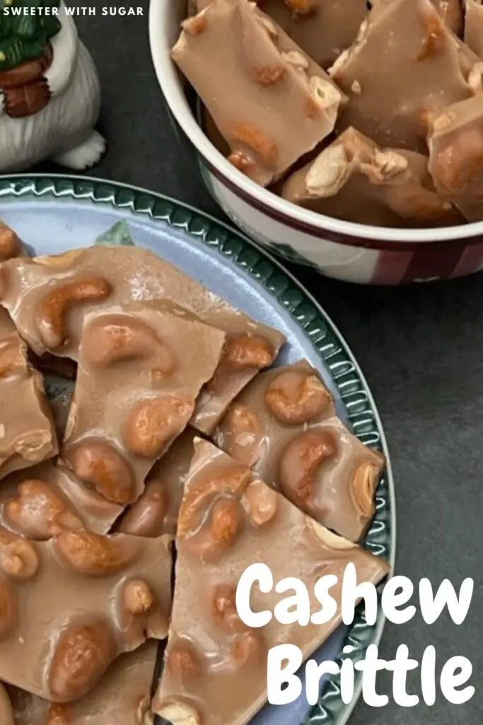 Cashew Brittle is a yummy homemade candy recipe. Cashew Brittle if full of delicious cashews surrounded by a crunchy toffee.  #Christmas #Holiday #Brittle #Toffee #GiftIdeas #Desserts #Candy #HomemadeCandy #Cashew