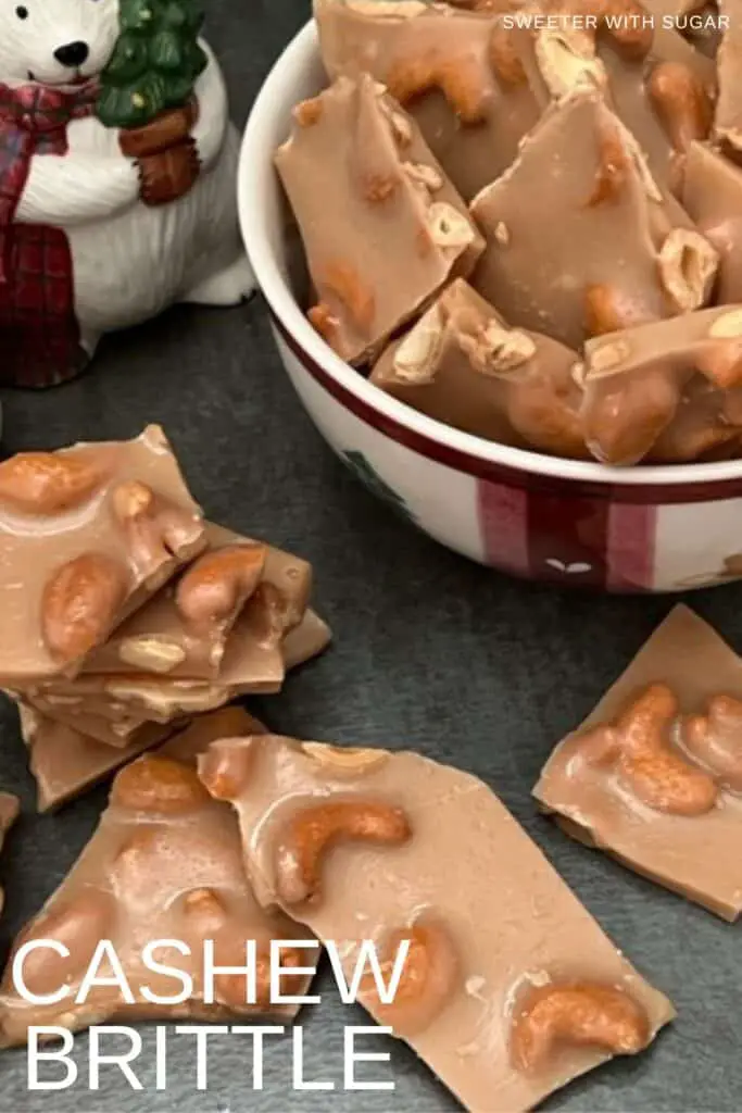 Cashew Brittle is a yummy homemade candy recipe. Cashew Brittle if full of delicious cashews surrounded by a crunchy toffee.  #Christmas #Holiday #Brittle #Toffee #GiftIdeas #Desserts #Candy #HomemadeCandy #Cashew