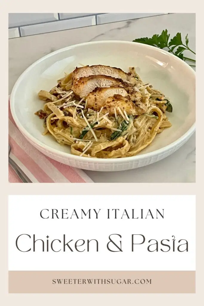 This Creamy Italian Chicken and Pasta dinner idea is a favorite comfort food recipe. The chicken is tender and flavorful. The creamy pasta sauce is full of sun dried tomatoes, baby spinach cream and parmesan cheese. #DinnerRecipes #ChickenRecipes #ItalianRecipes #ChickenDinner #Pasta #CreamyPastaSauce #CreamyItalianChickenandPasta