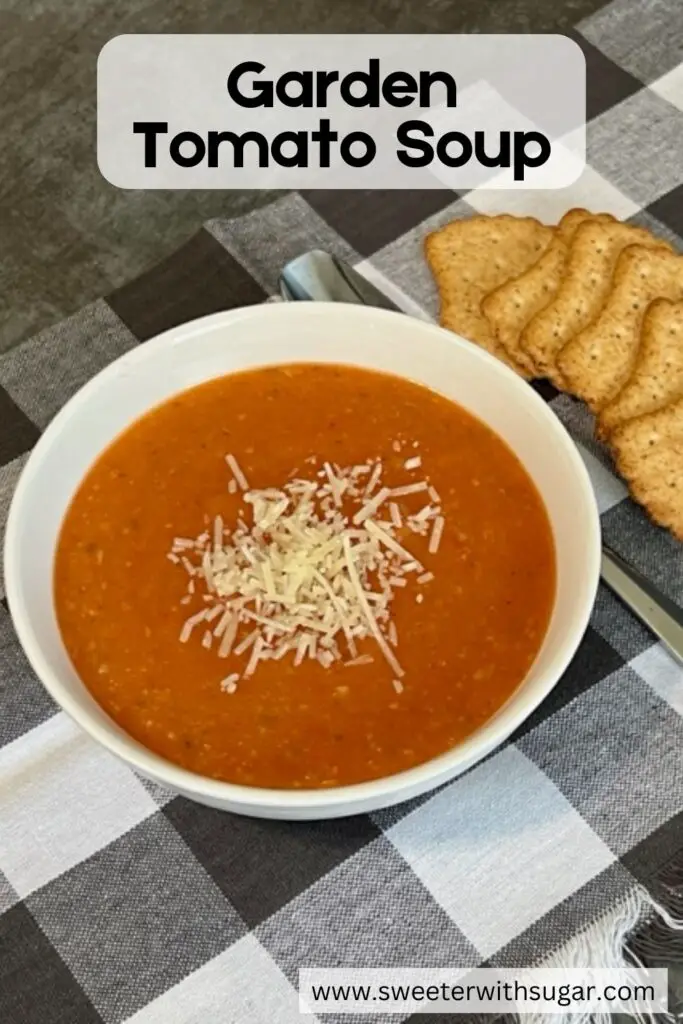 This Garden Tomato Soup recipe is full of ripe, juicy tomatoes, fresh basil and more. It is perfect for chilly evenings or as a side to your favorite grilled cheese sandwich. Homemade tomato basil soup is an all-time favorite comfort food. #GardenRecipes #SoupRecipes #TomatoBasilSoup #ComfortFoodRecipes #TomatoSoup #HowToUseGardenTomatoes