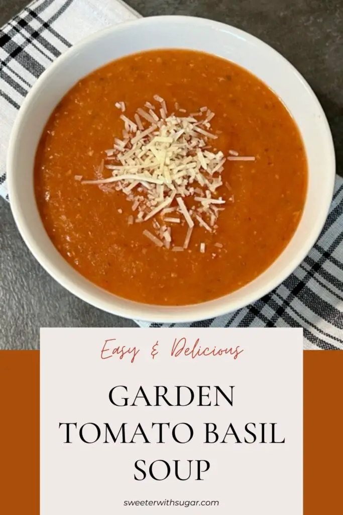 This Garden Tomato Soup recipe is full of ripe, juicy tomatoes, fresh basil and more. It is perfect for chilly evenings or as a side to your favorite grilled cheese sandwich. Homemade tomato basil soup is an all-time favorite comfort food. #GardenRecipes #SoupRecipes #TomatoBasilSoup #ComfortFoodRecipes #TomatoSoup #HowToUseGardenTomatoes