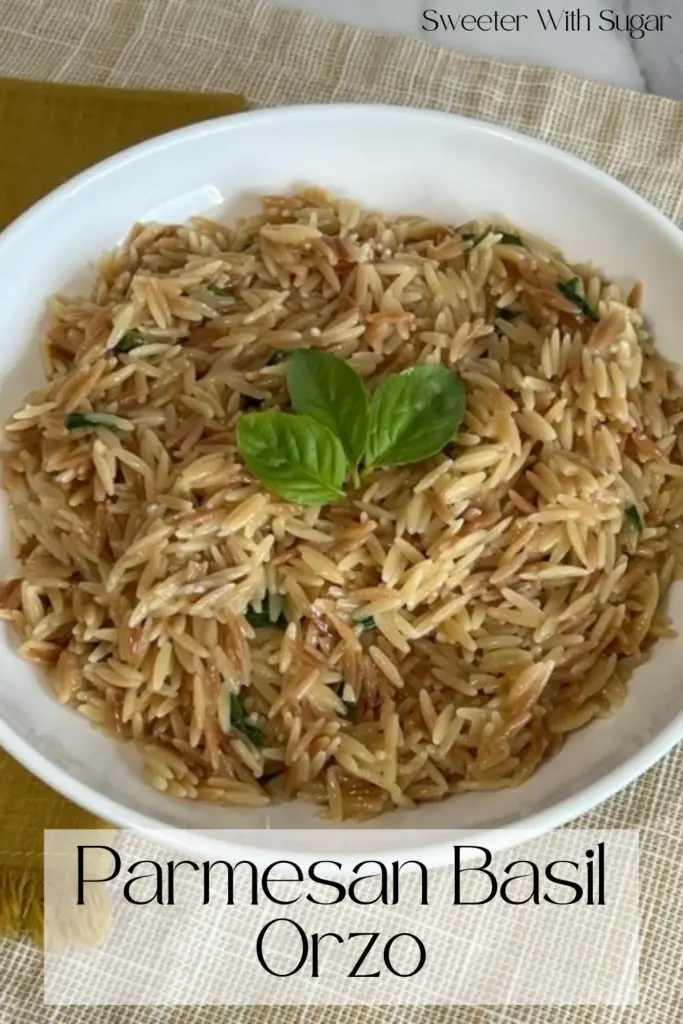 We love orzo pasta-it's just fun! This Parmesan Basil Orzo combines all the right flavors together in a delicious side dish. You can pair this side with chicken, fish, or beef. #OrzoRecipes #EasySides #VersatileSideDishRecipes #PastaRecipes #Basil #ParmesanCheese