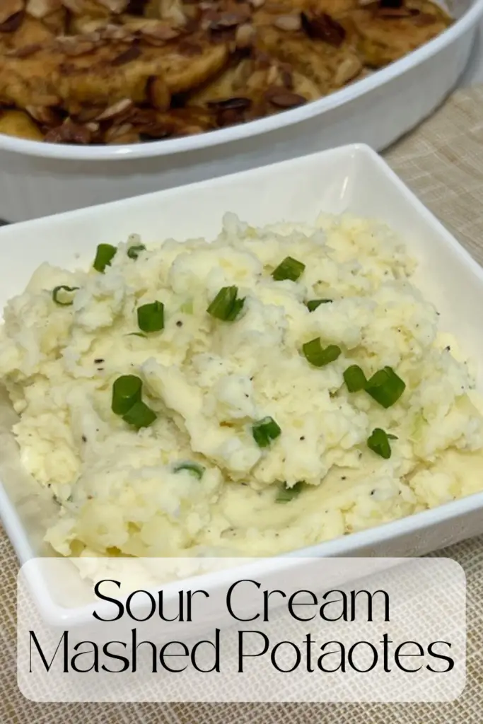 Sour Cream Mashed Potatoes are a simple side dish recipe that goes great alongside of chicken, pork or beef. #SideDishRecipes #PotatoRecipes #MashedPotatoes #CreamyMashedPotatoes