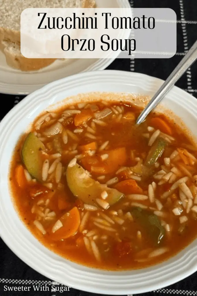 Zucchini Tomato Orzo Soup is full of delicious garden produce. Soup makes a perfect meal or side dish. This zucchini soup is easy to make and full of flavor. #GardenRecipes #SoupRecipes #ZucchiniRecipes #OrzoRecipes