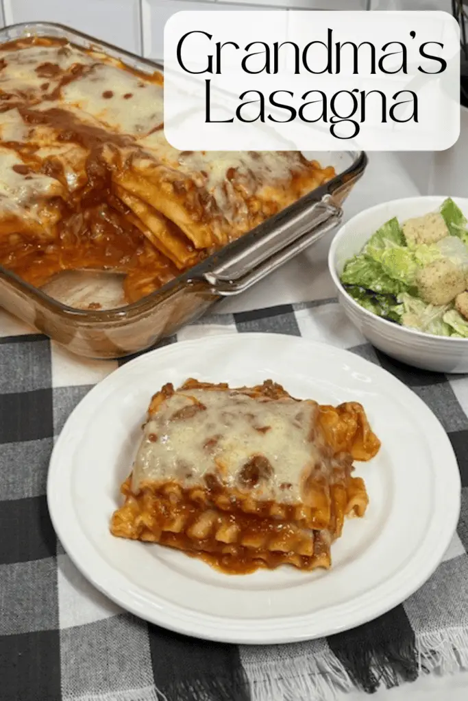 A slice of homemade Grandma's Lasagna with layers of melted cheese, meat sauce, and pasta, served on a white plate with fresh basil garnish.
#HomemadeLasagna #ClassicLasagna #CheesyLasagna #ItalianComfortFood #BakedPasta #FamilyDinner #LasagnaLovers #EasyLasagnaRecipe