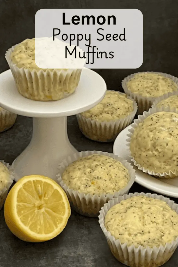 A batch of golden lemon poppy seed muffins with a light drizzle of lemon glaze, sitting on a white cake plate.
#LemonPoppySeedMuffins #EasyBaking #HomemadeMuffins #LemonLovers #SpringBaking #MoistMuffins #BreakfastIdeas