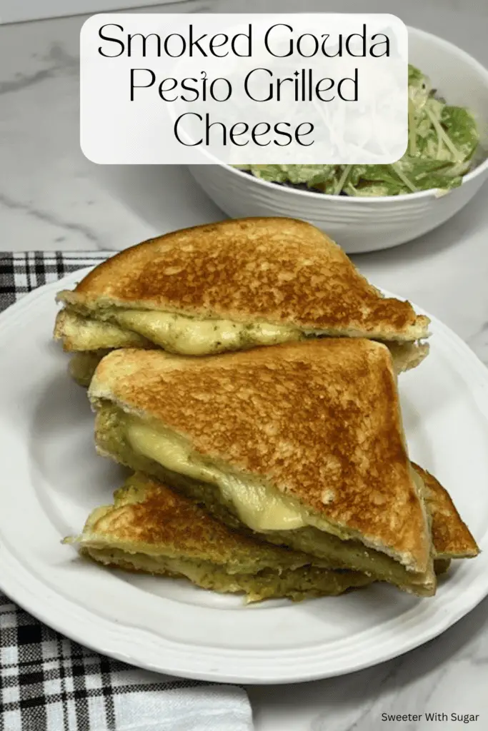 Try the ultimate grilled cheese sandwich! This Smoked Gouda Basil Pesto Grilled Cheese is delicious! With buttery, crispy bread filled with melty smoked gouda cheese and flavorful basil pesto makes this gourmet grilled cheese sandwich a must-try. Perfect for a quick lunch, easy dinner, or a comfort food craving!
#GrilledCheese #SmokedGouda #PestoLover #EasyDinner #ComfortFood #CheeseLover #GourmetGrilledCheese