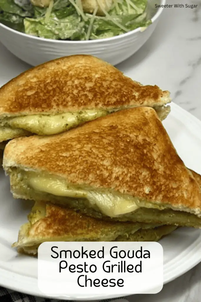 Try the ultimate grilled cheese sandwich! This Smoked Gouda Basil Pesto Grilled Cheese is delicious! With buttery, crispy bread filled with melty smoked gouda cheese and flavorful basil pesto makes this gourmet grilled cheese sandwich a must-try. Perfect for a quick lunch, easy dinner, or a comfort food craving!
#GrilledCheese #SmokedGouda #PestoLover #EasyDinner #ComfortFood #CheeseLover #GourmetGrilledCheese