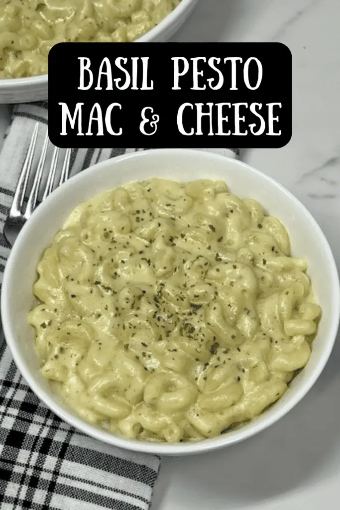 Upgrade your classic mac and cheese with this Basil Pesto Mac & Cheese! This creamy, cheesy pasta dish combines rich, basil pesto with a velvety cheese sauce for the ultimate flavor-packed comfort food. Made with tender pasta, gooey melted cheese, and basil pesto, this gourmet mac and cheese recipe is perfect for weeknight dinners, special occasions, or meal prep. Whether you're a pesto lover or just looking for a fun twist on a classic dish, this homemade mac and cheese with pesto will be your new favorite! #PestoMacAndCheese #MacAndCheeseLover #ComfortFood #EasyDinner #CheeseLover #PastaRecipes #BasilPesto
