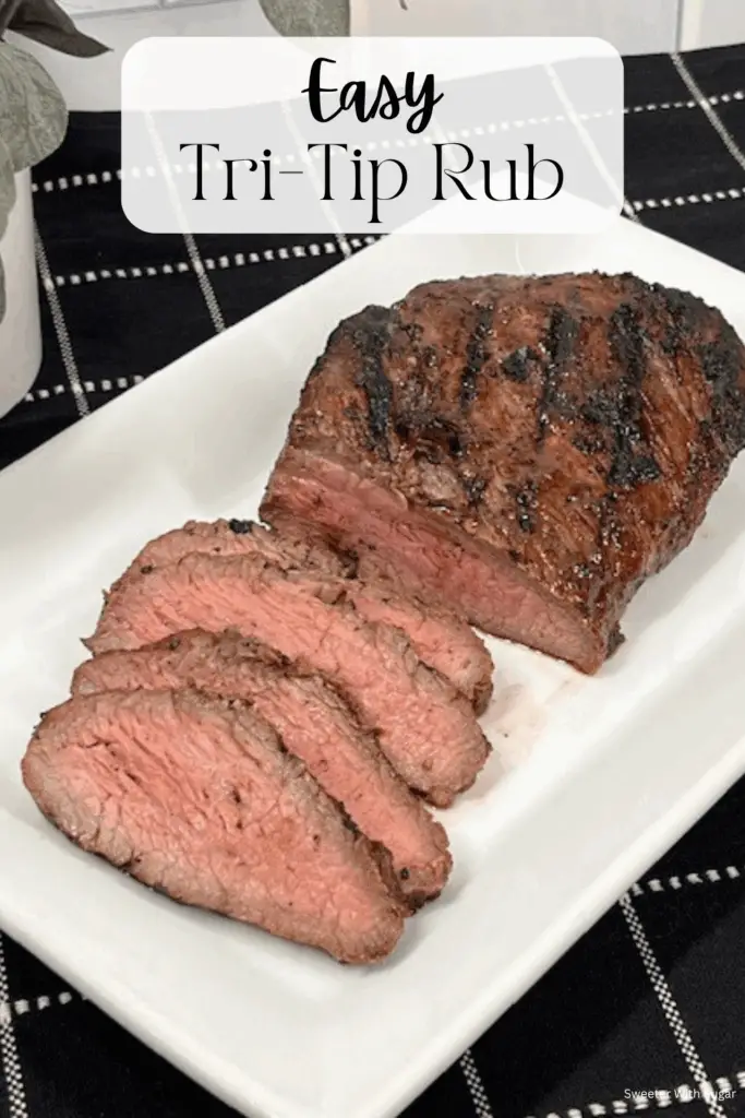 A Tri-tip roast with seasoned crust fresh from the grill or smoker. Easy Tri-Tip Rub is bold, savory, and the perfect recipe for a deliciously seasoned beef dinner! It is made with simple pantry spices like smoked paprika, garlic powder, brown sugar, and black pepper. #Tri-TipRub #BeefDryRub #GrillingRecipes #GlutenFree #BBQRub