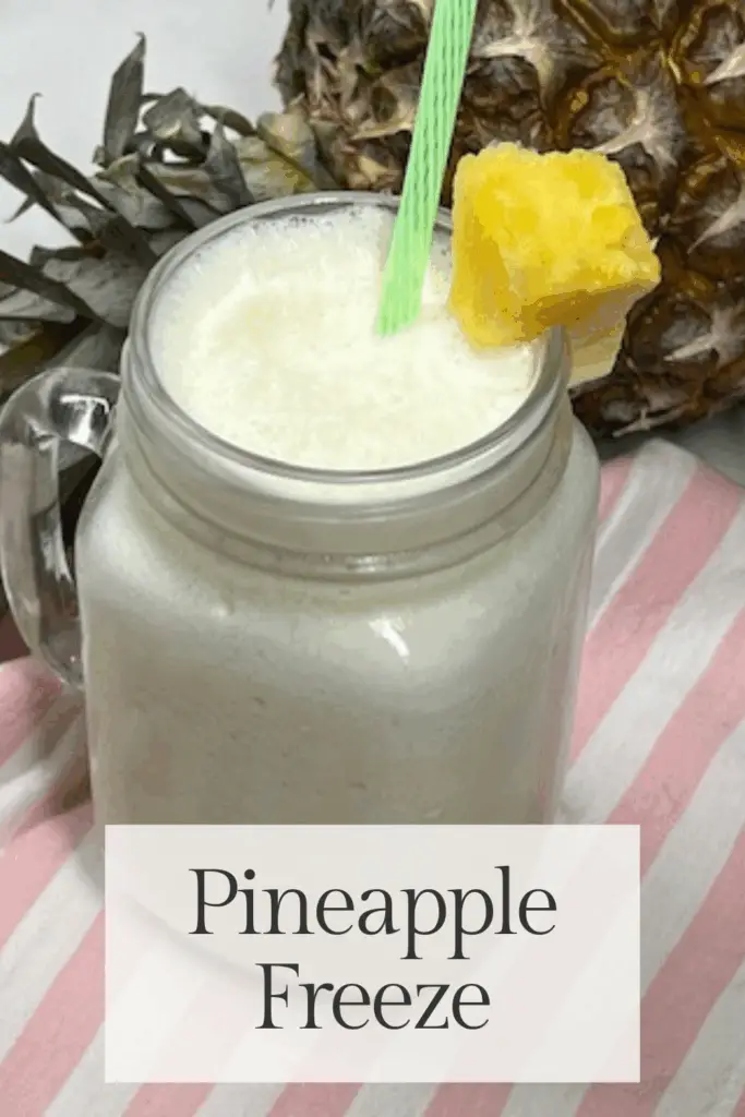 This Pineapple Freeze beverage is a quick and easy frozen treat perfect for hot summer days, family gatherings, or just a fun dessert beverage! It is made with just a few simple ingredients. It's cool, creamy and icy with a tropical flavor in every sip. #PineappleFreeze #SummerSnacks #FrozenFruitDessert #BlenderTreat #EasyPineappleRecipe #HomemadeDoleWhip #TropicalDesserts