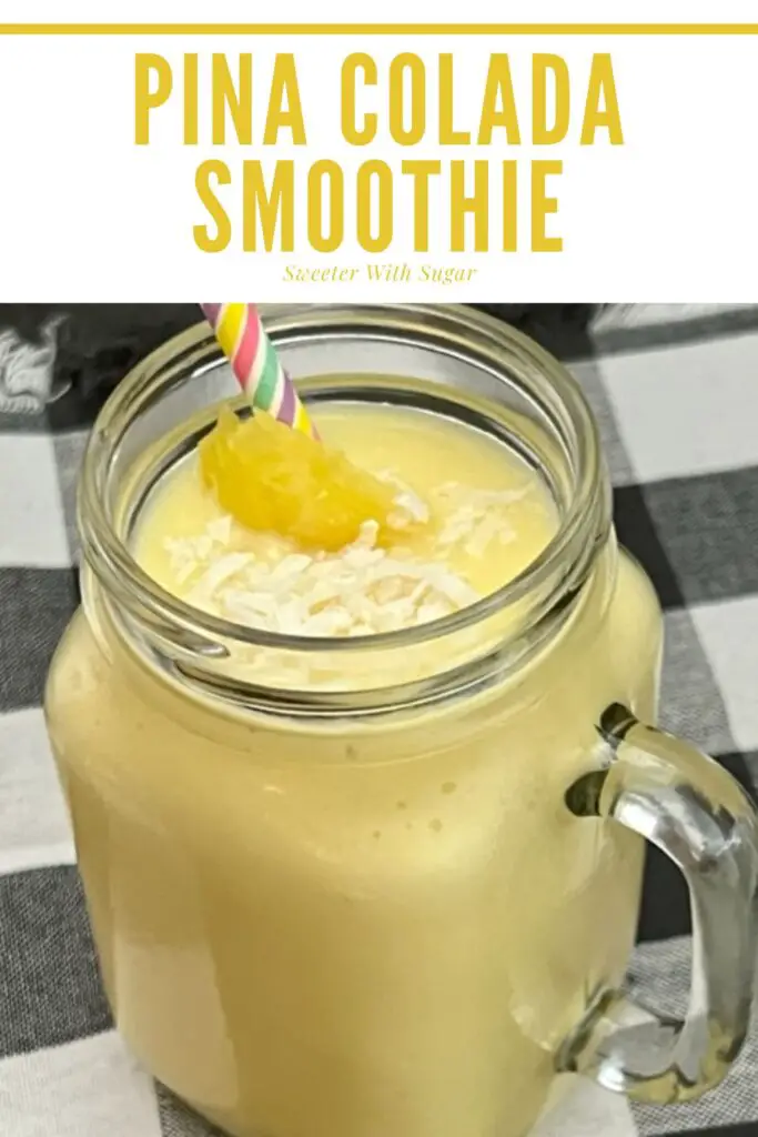 A Pina Colada Smoothie in a glass with a sprinkle of coconut and a slice of pineapple.