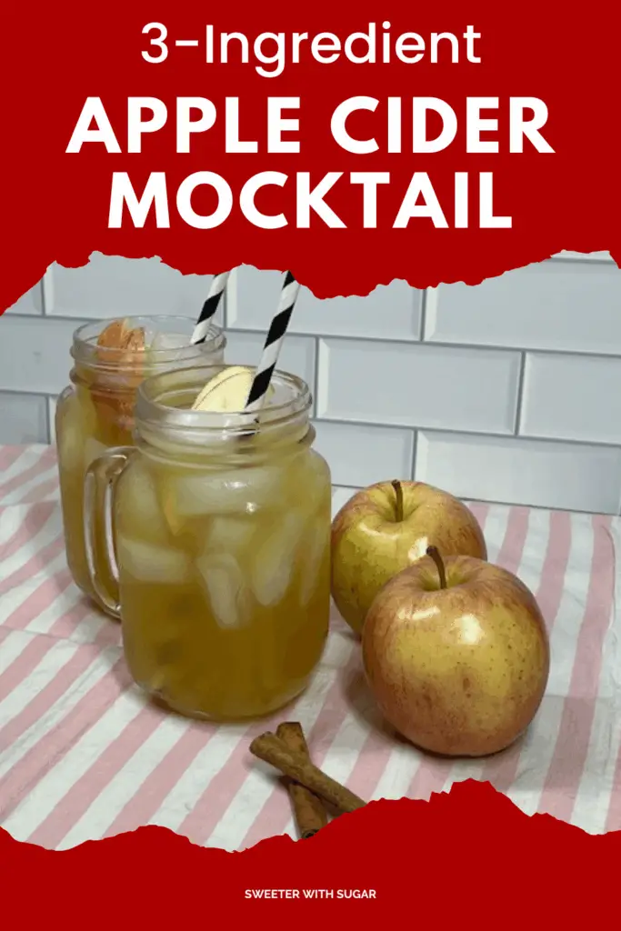 A glass of apple cider mocktail made with apple cider, ginger ale, and orange juice.